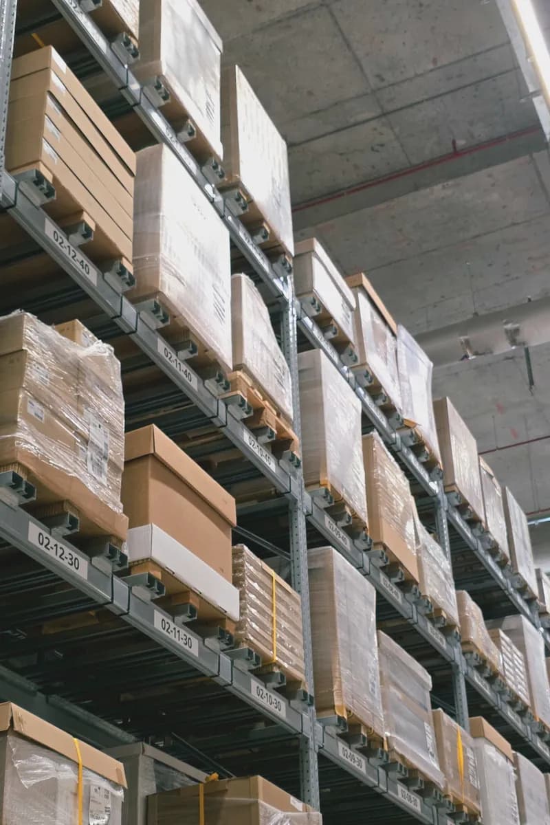 Warehouse racks holding stored goods